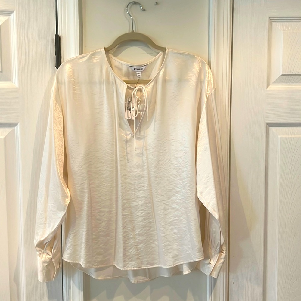 Express Cream colored blouse size M fits like a M-L